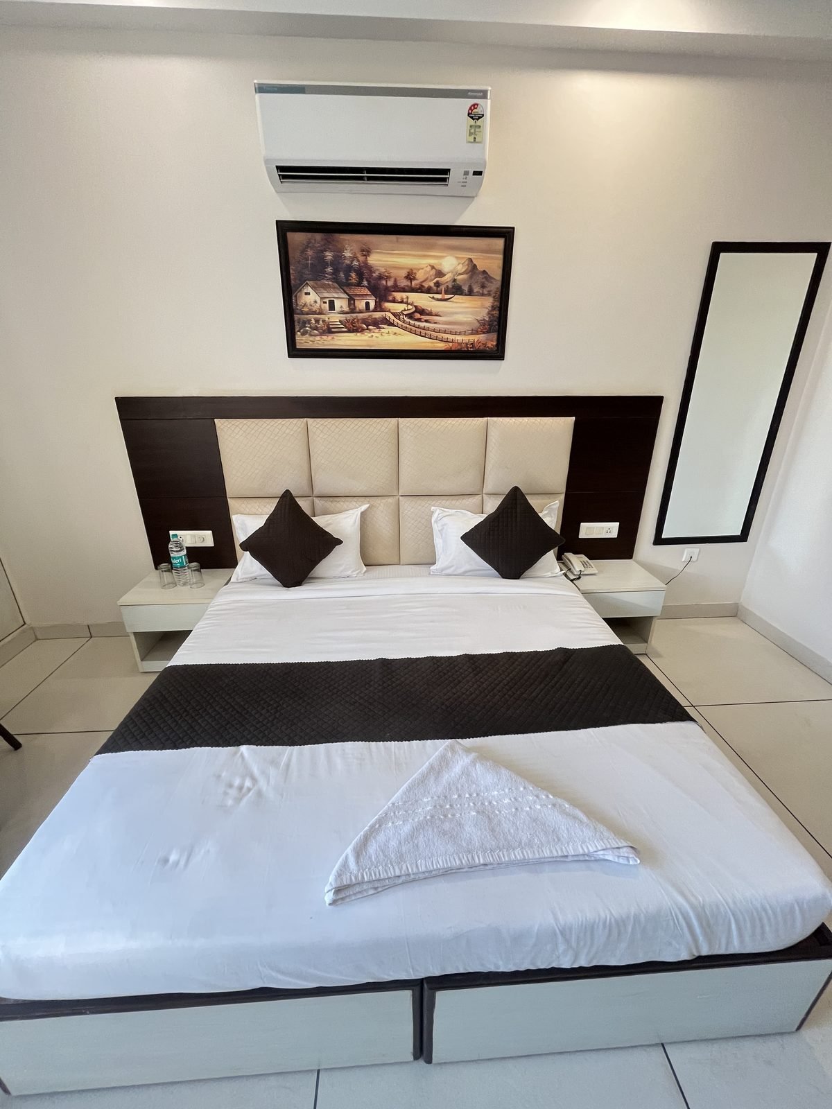 Guest room at The Milford Noida
